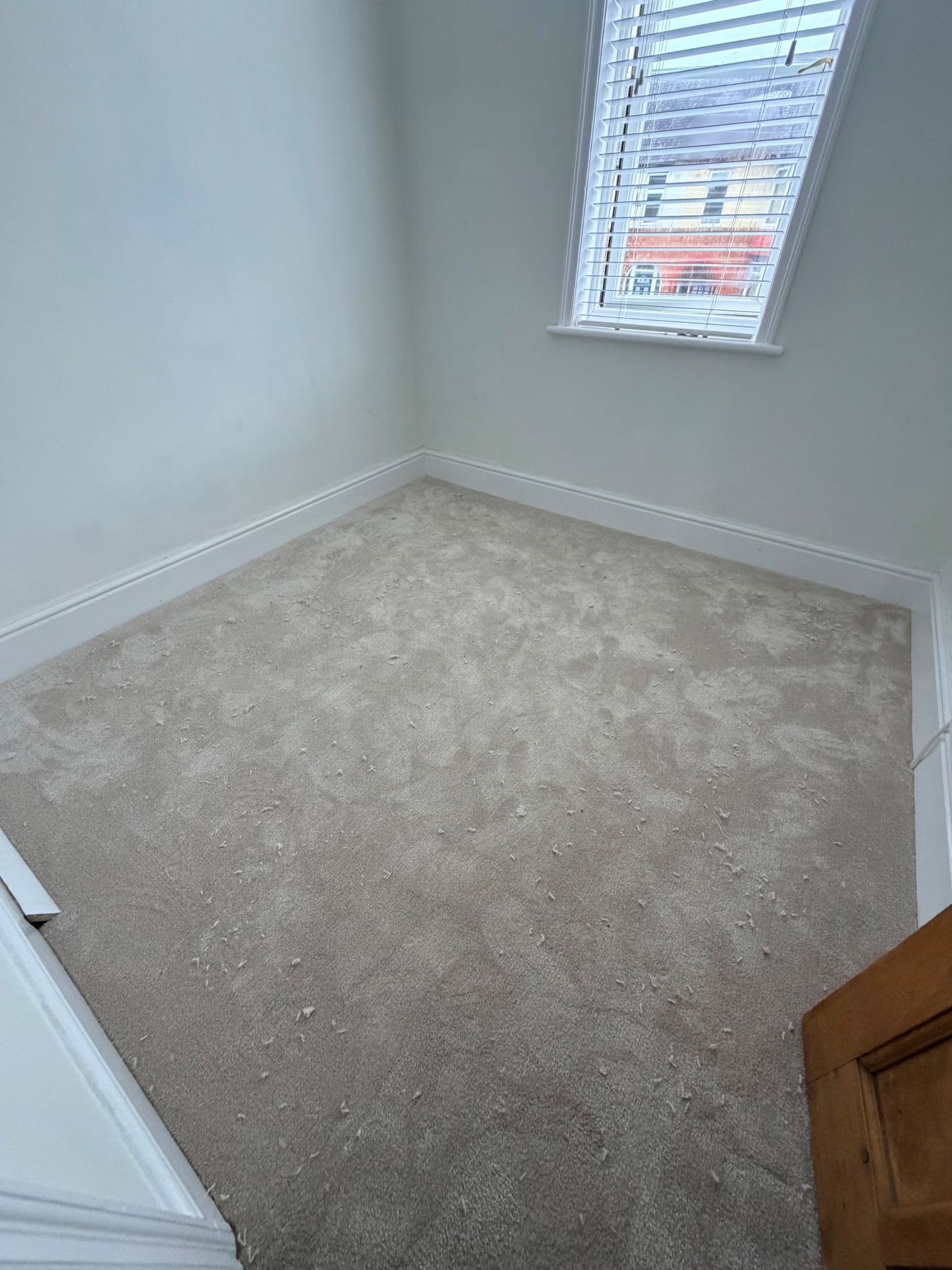 Beige bedroom carpet fitting — Darlington