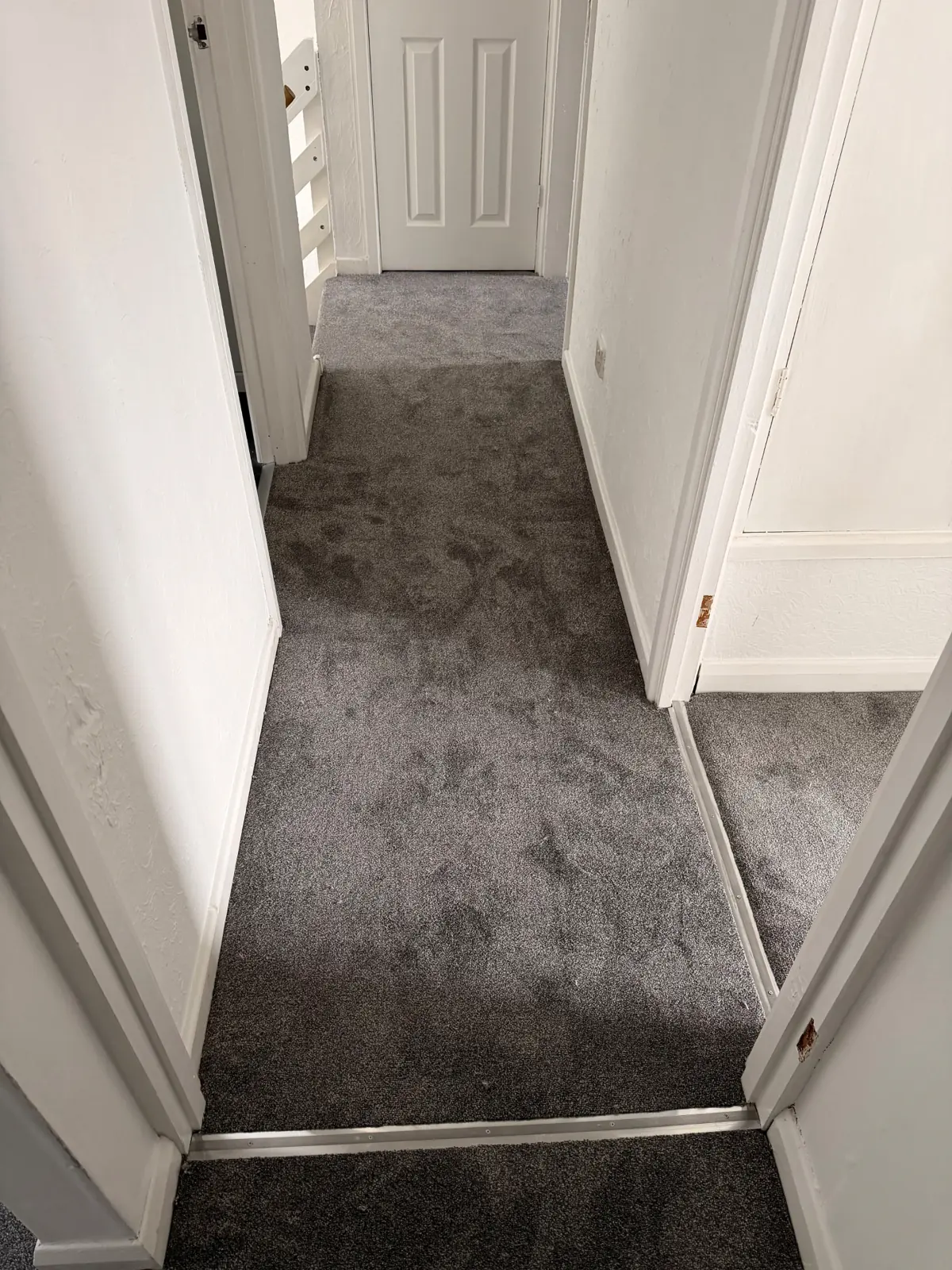 Dark grey hallway carpet fitted in a Newton Aycliffe home