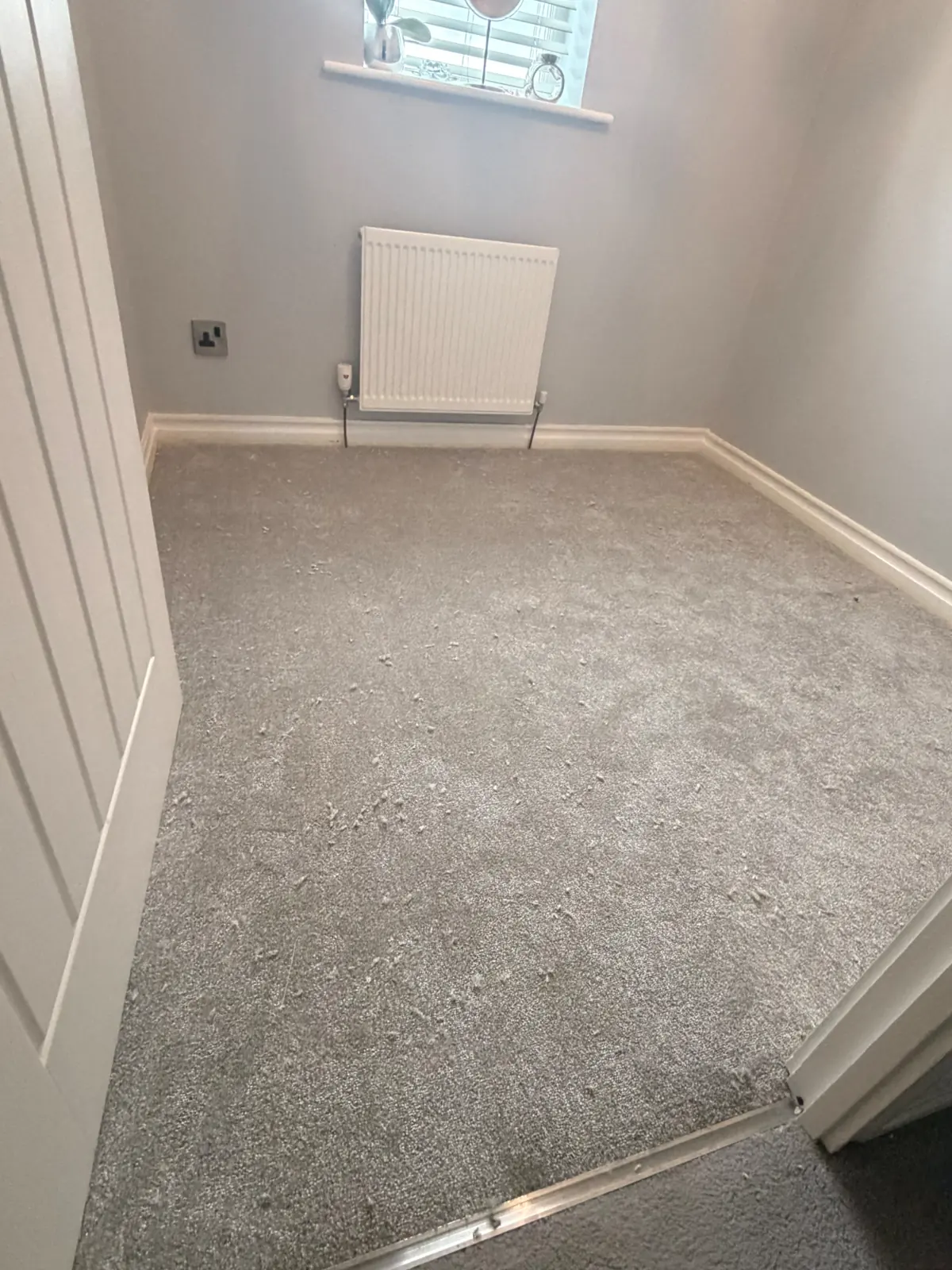 Stone-coloured bedroom carpet fitted in Darlington