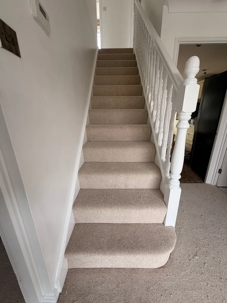 Beige carpet fitted on a full staircase in a Yarm home